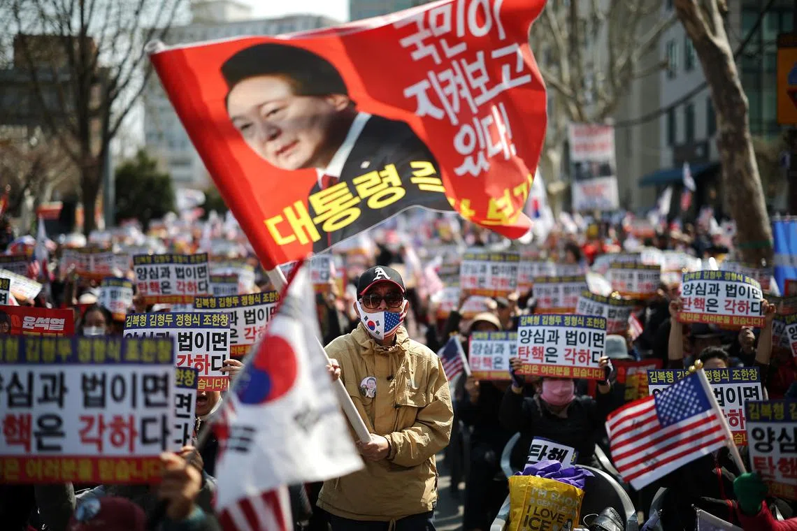 Far-right protesters attend a rally to support impeached South Korean President Yoon Suk Yeol near the Constitutional Court in Seoul, South Korea, April 3, 2025.   REUTERS/Kim Hong-Ji