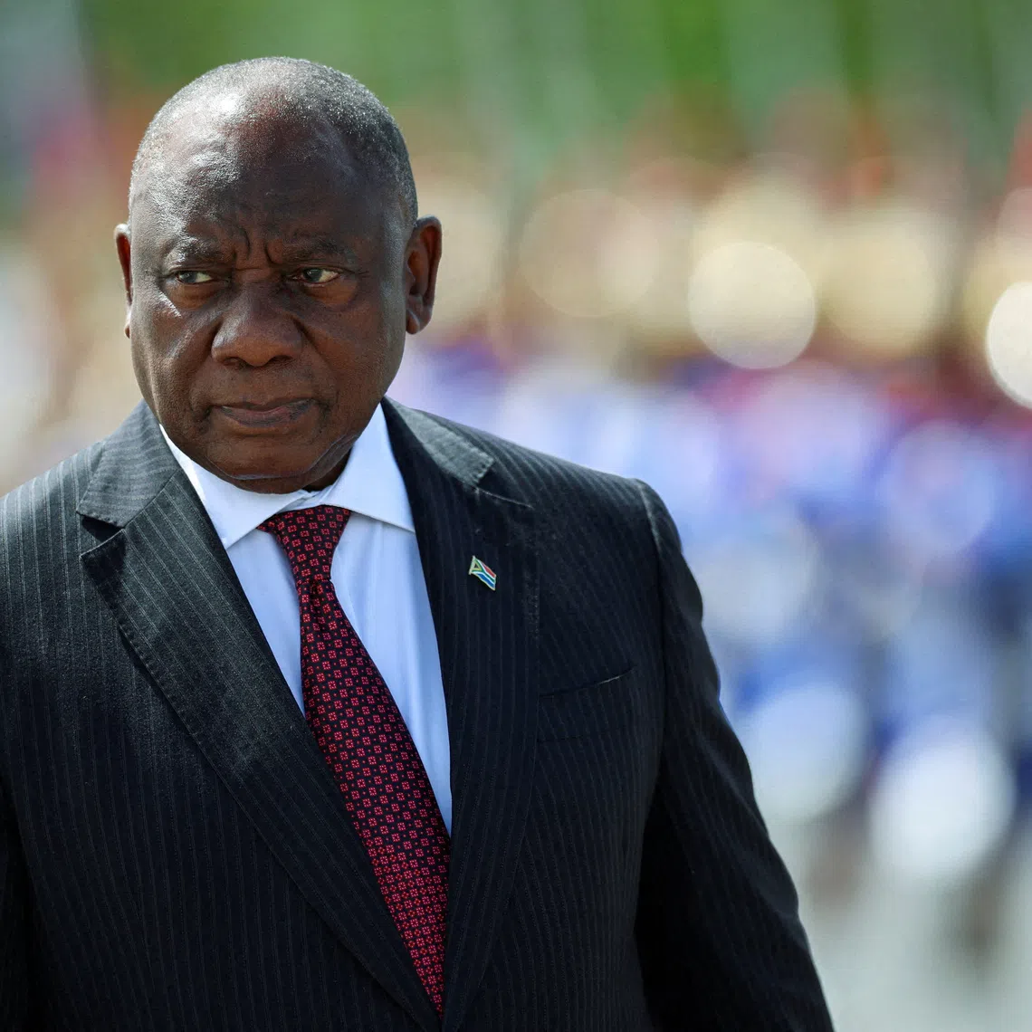 FILE PHOTO: South Africa's President Cyril Ramaphosa reviews the honour guard, on the day he meets Brazil's President Luiz Inacio Lula da Silva at Planalto Palace, in Brasilia, Brazil, March 9, 2026. REUTERS/Adriano Machado//File Photo