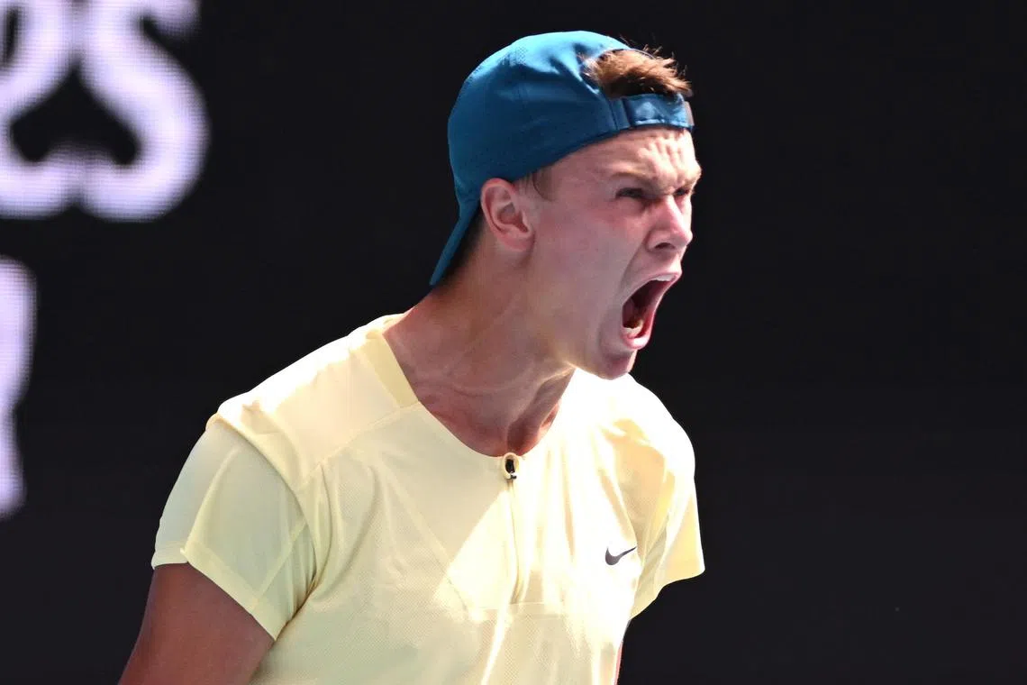 Holger Rune of Denmark screams in relief and joy after winning his third-round match against Ugo Humbert of France. 