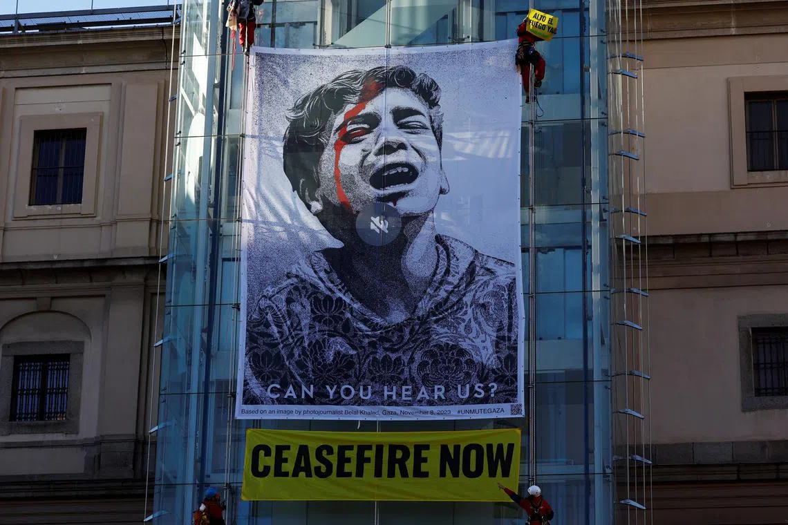 The illustration put up by the activists is titled "Obey", and depicts a photograph taken by a Gazan photojournalist. 