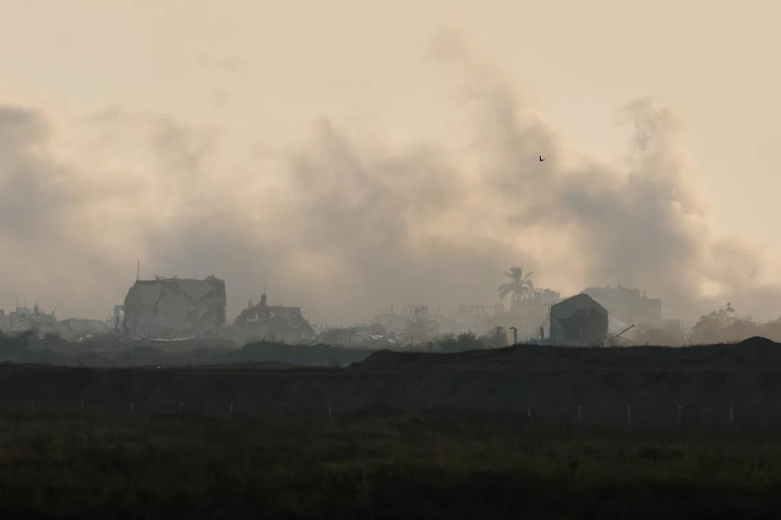 FILE PHOTO: Smoke rises over Gaza following an explosion, amid the conflict between Israel and Hamas, as seen from Israel, July 25, 2024. REUTERS/Amir Cohen/File Photo