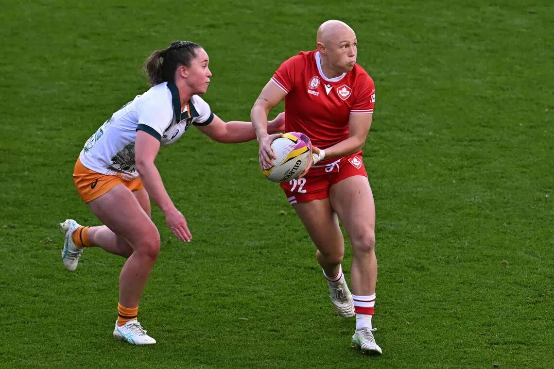 Canada's Olivia Apps passing the ball in the Women’s Rugby World Cup quarter-final against Australia at Ashton Gate Stadium in Bristol, England, on Sept 13, 2025.