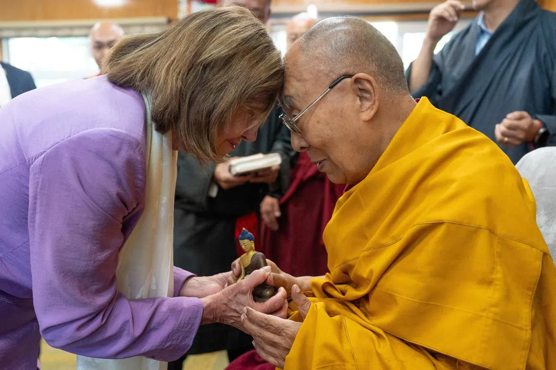 Tibetan spiritual leader, the Dalai Lama exchanges greetings with former U.S. House Speaker Nancy Pelosi during their meeting at Dharamshala, Himachal Pradesh, India, June 19, 2024. Tenzin Choejor/Office of His Holiness the Dalai Lama/Handout via REUTERS