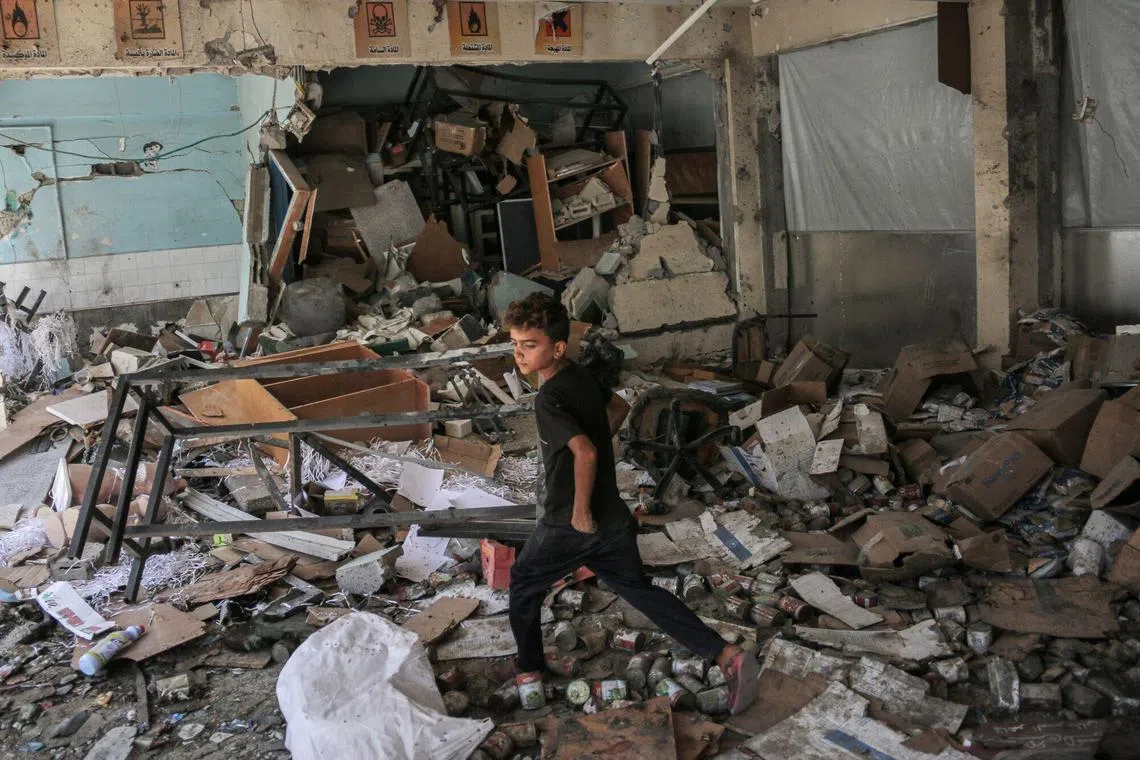 UN officials say six of their staff were among 18 people killed in a Sept 11 Israeli strike on a school in central Gaza’s Nuseirat.