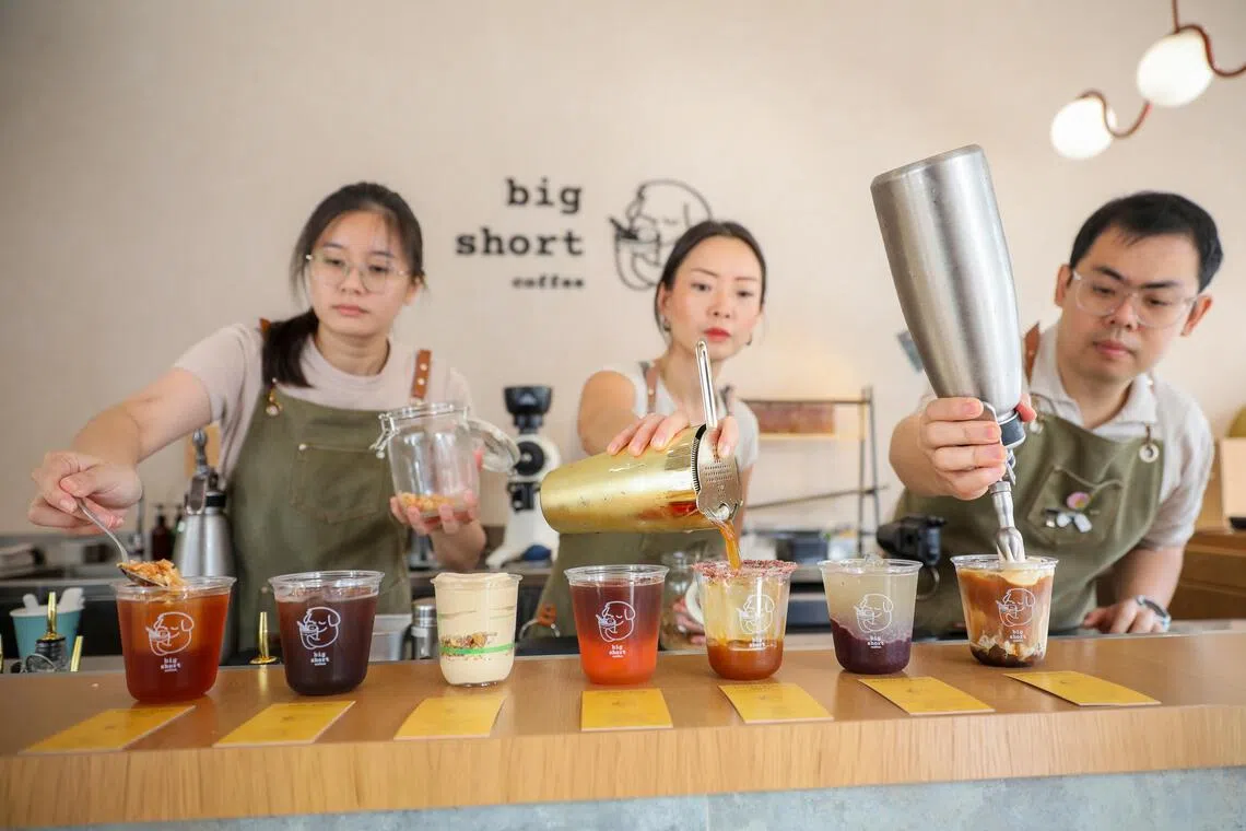 Baristas at Big Short Coffee in the process of making their cocktail-esque coffee.