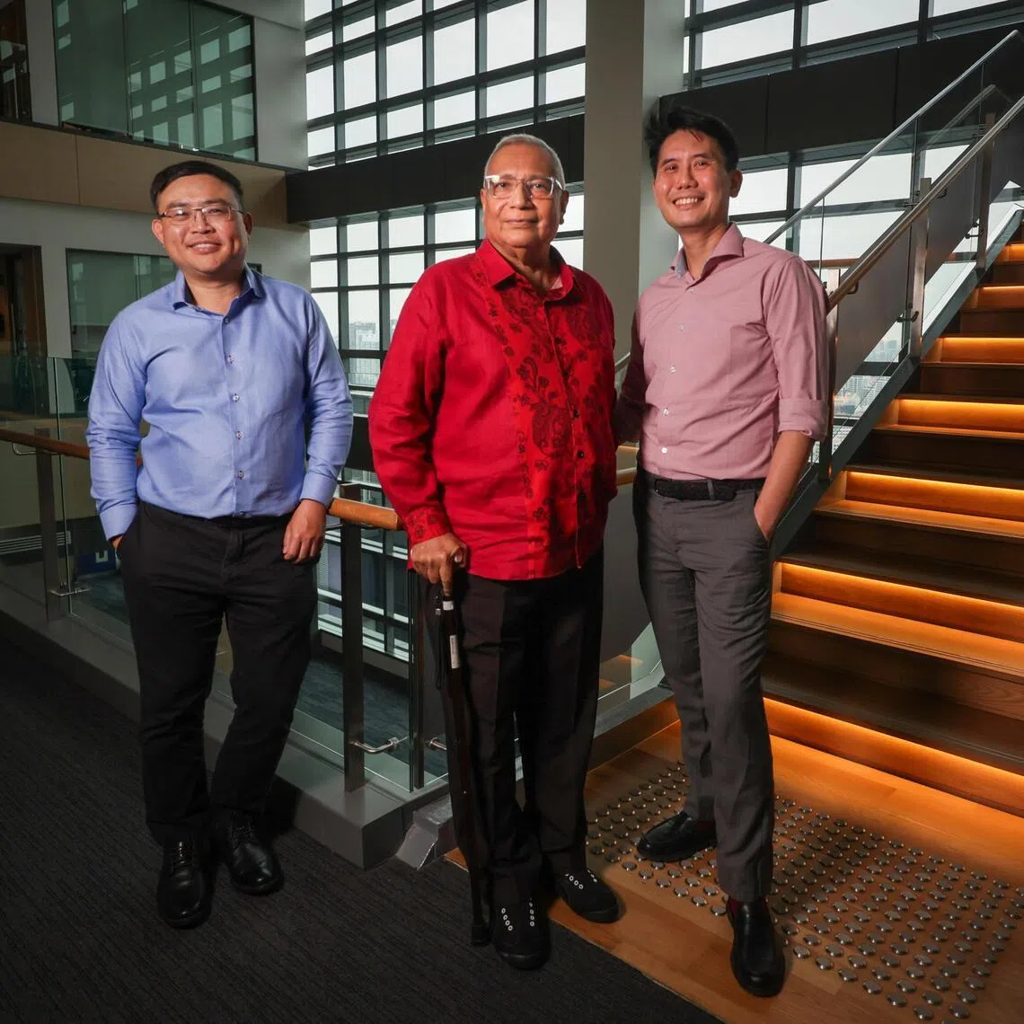 Brian Goh (left), principal investigator of the Histotripsy for Ablation of Liver Tumours study, and NCCS director of interventional oncology Too Chow Wei (right) with Mahamood Ahamed, a patient who underwent histotripsy.