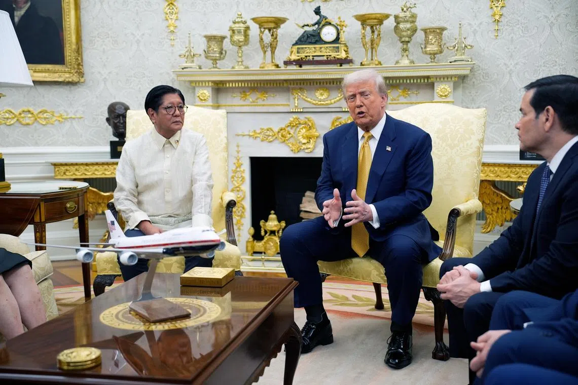 US President Donald Trump (centre) meeting Philippine President Ferdinand Marcos Jr (left) at the White House on July 22.
