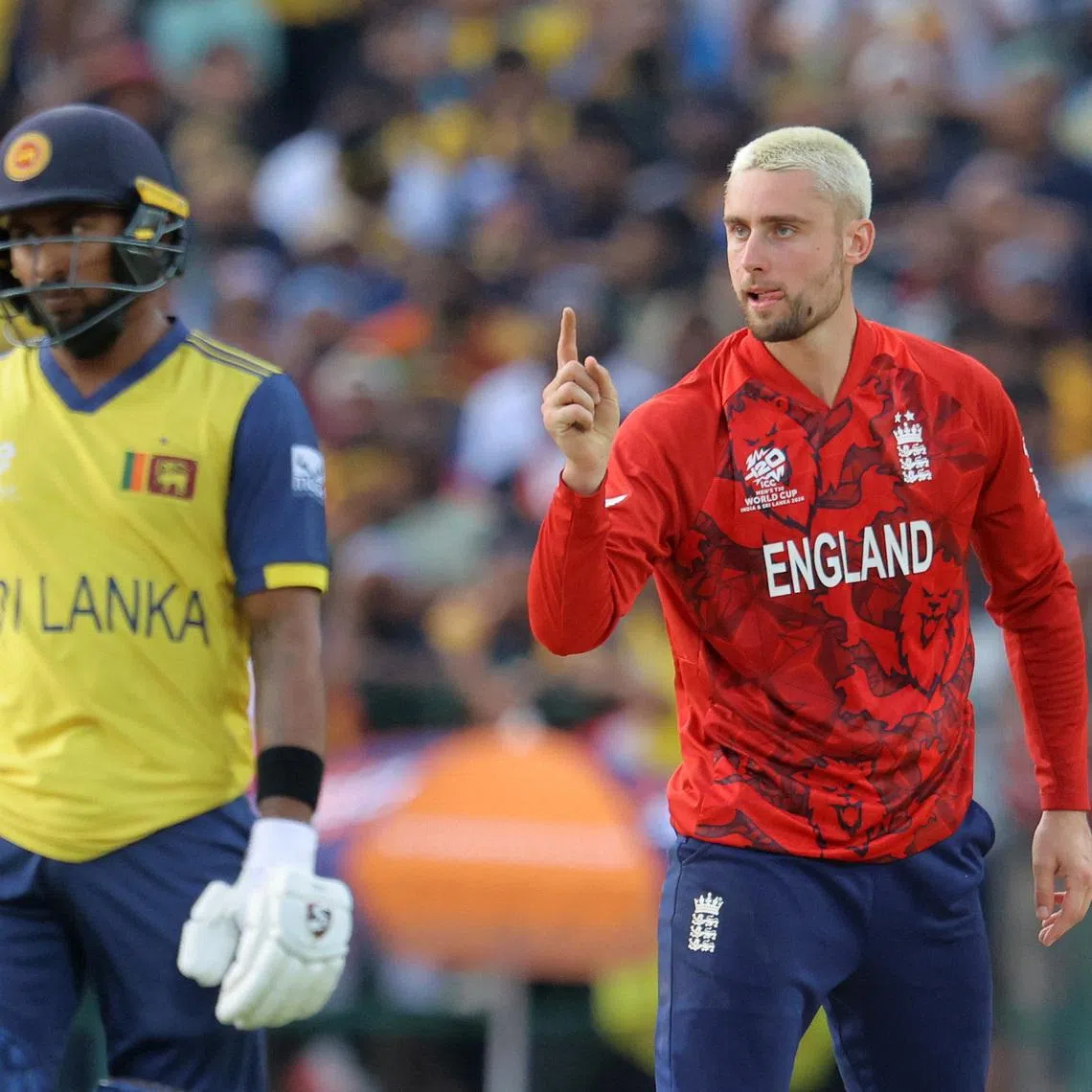 Cricket - ICC Men's T20 World Cup 2026 - Super 8 - Sri Lanka v England - Pallekele International Cricket Stadium, Kandy, Sri Lanka - February 22, 2026 England's Will Jacks celebrates after taking the wicket of Sri Lanka's Dunith Wellalage, caught out by Harry Brook REUTERS/Lahiru Harshana