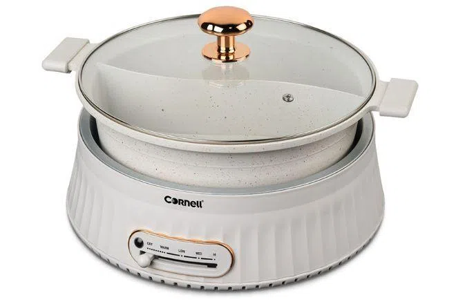 Лучшая пароварка: мультиварка Cornell Steamboat с кастрюлей Yuan Yang Pot.