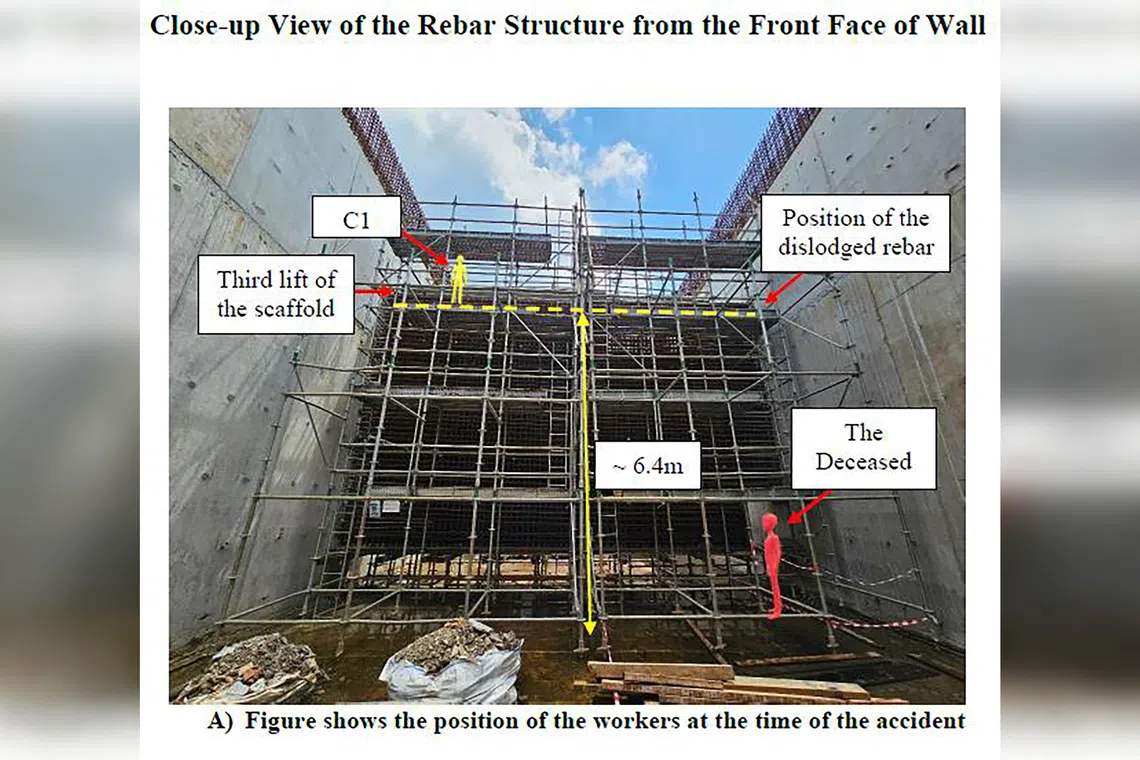 Mr Zhan Fugui was working on the ground level of a steel reinforcement structure for a wall, while Mr Feng was working on a scaffold above him.