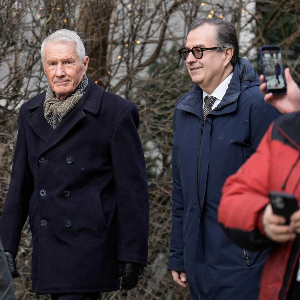 Lawyer Anders Brosveet (right) and former prime minister of Norway Thorbjorn Jagland walk in in Oslo on Feb 12, 2026.