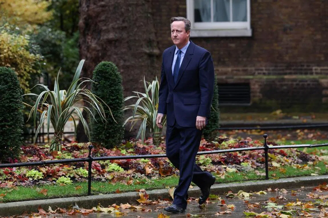 FILE PHOTO: Former British Prime Minister David Cameron walks outside 10 Downing Street in London, Britain November 13, 2023. REUTERS/Suzanne Plunkett/File Photo