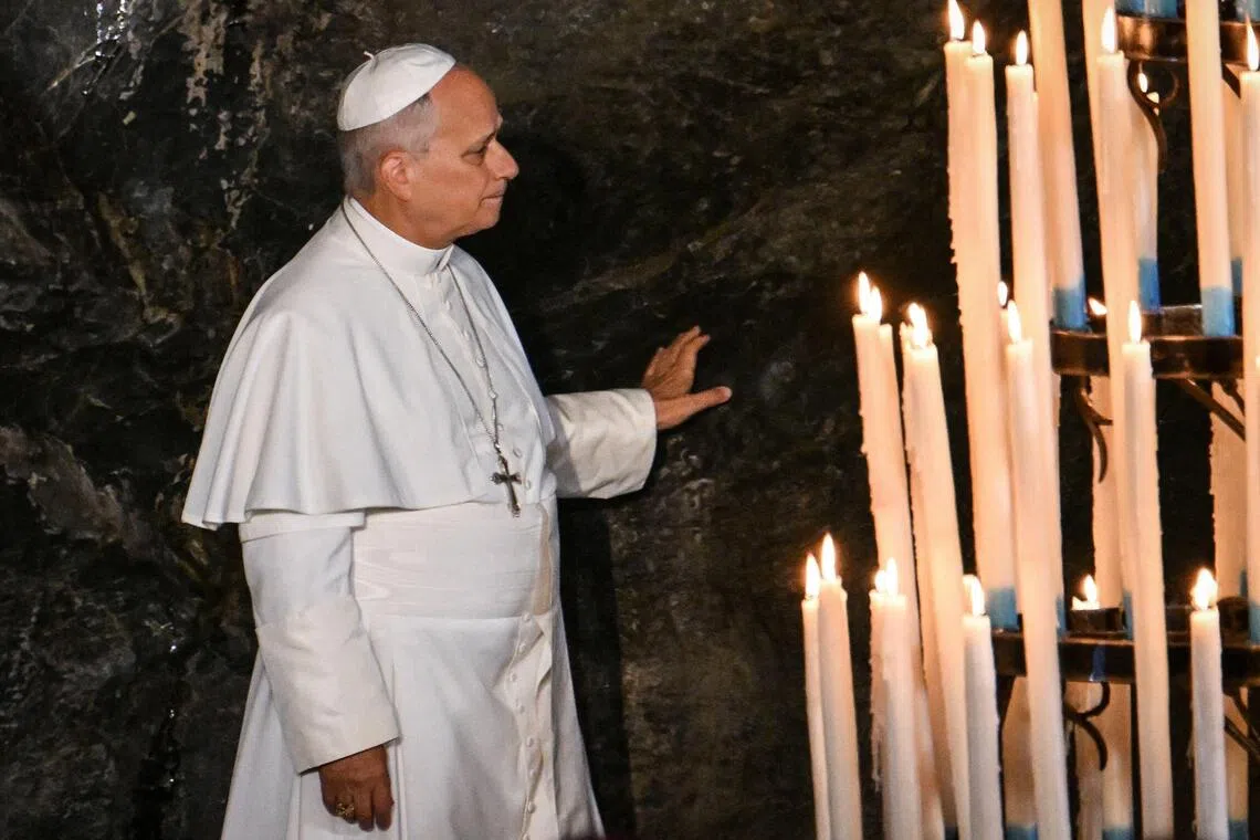 Pope prays at Lourdes shrine after huge Paris mass