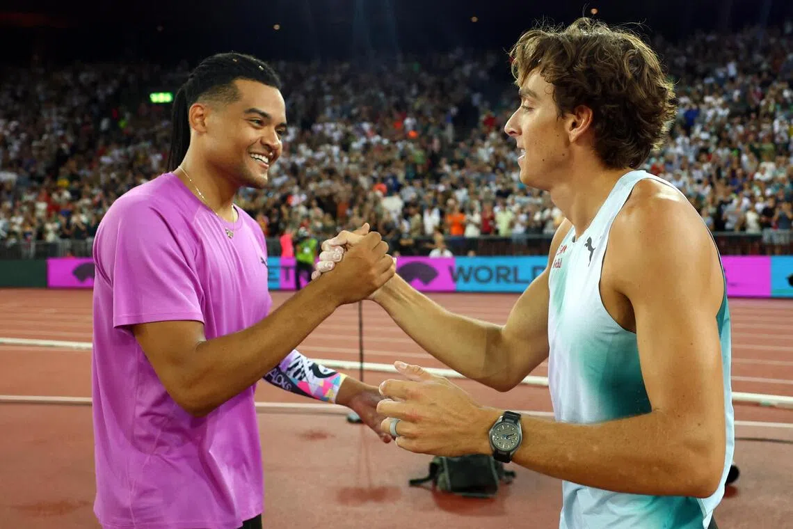 Sweden’s winner Armand Duplantis (right) and Greece’s runner-up Emmanouil Karalis congratulate each other after the Diamond League pole vault final on Aug 27.