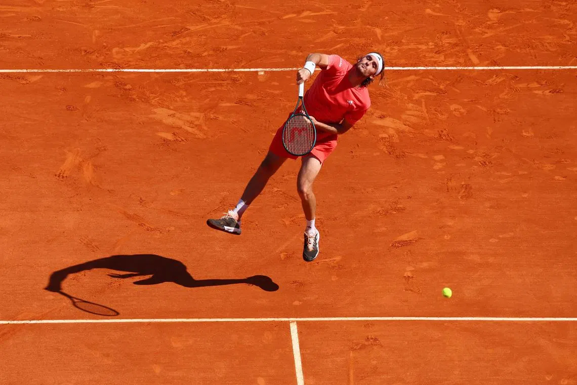 Greece's Stefanos Tsitsipas in action during his Monte Carlo Masters semi-final match against Italy's Jannik Sinner.