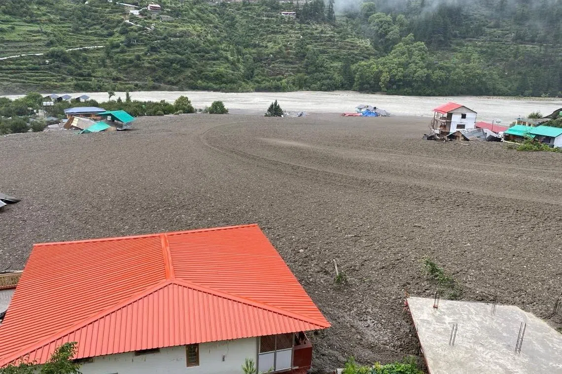FILE PHOTO: Houses are partially buried by a mudslide, amid flash floods, in Dharali, Uttarakhand, India, August 5, 2025. Indian Army Central Command via X/Handout via REUTERS/File Photo