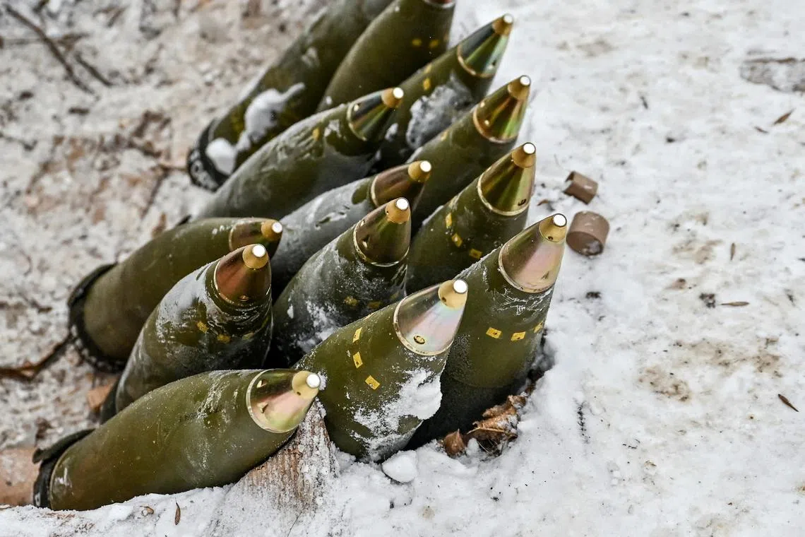 FILE PHOTO: 155mm artillery shells are placed in a pile at a position of Ukrainian servicemen near a front line, amid Russia's attack on Ukraine, in Zaporizhzhia region, Ukraine January 14, 2024. REUTERS/Stringer/File Photo
