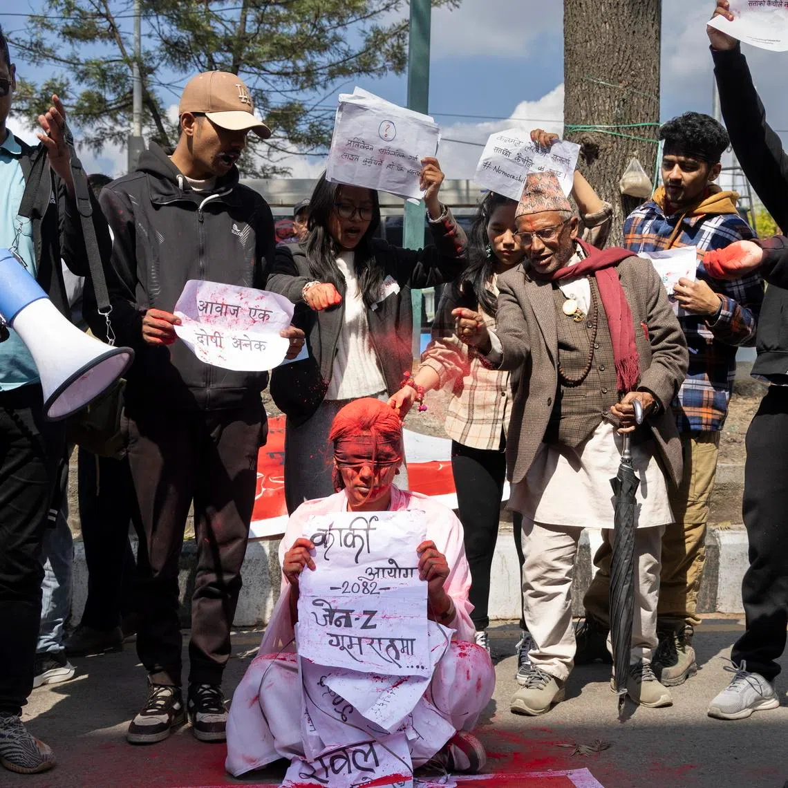 Nepalese Gen Zs stage a symbolic protest in Kathmandu, Nepal, on March 22, demanding the release of findings into the deadly September 2025 uprising, which forced the previous government to collapse.