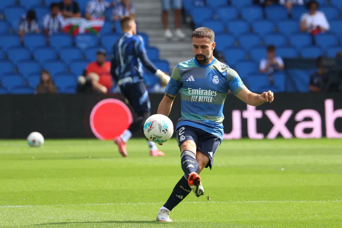 Soccer Football - LaLiga - Real Sociedad v Real Madrid - Reale Arena, San Sebastian, Spain - September 13, 2025 Real Madrid's Dani Carvajal during the warm up before the match REUTERS/Pankra Nieto