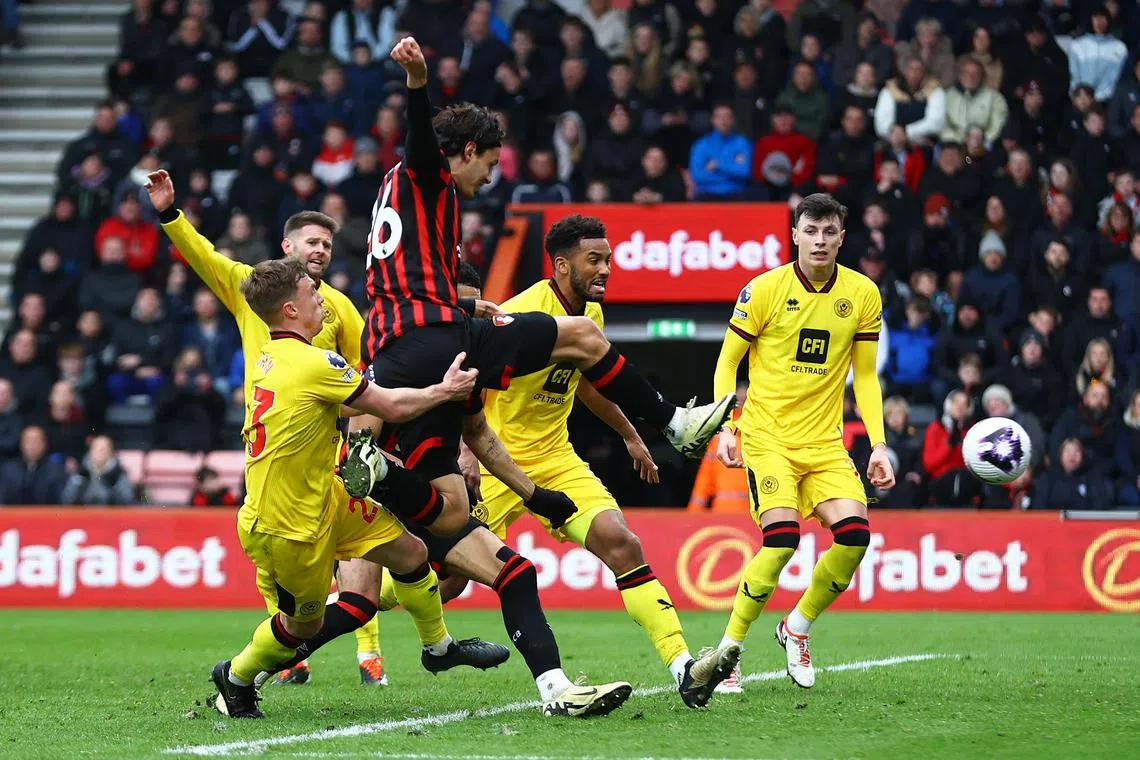 Bournemouth's Enes Unal scores their second goal, to draw level.