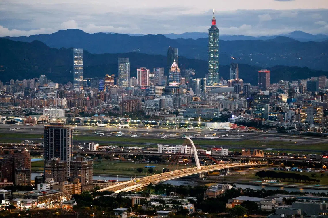A general view shows Taipei city skyline, including the Taipei 101 skyscraper, with Songshan Airport in the foreground in Taipei, Taiwan February 23, 2026. REUTERS/Ann Wang