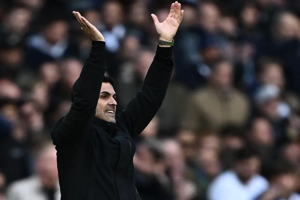 Soccer Football - Premier League - Tottenham Hotspur v Arsenal - Tottenham Hotspur Stadium, London, Britain - April 28, 2024 Arsenal manager Mikel Arteta celebrates after the match REUTERS/Dylan Martinez
