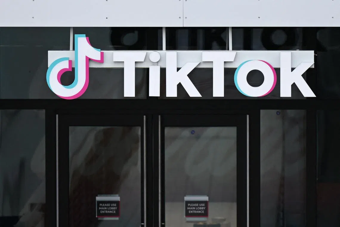 (FILES) The TikTok logo is displayed on signage outside TikTok social media app company offices in Culver City, California, on March 16, 2023. Beijing warned on March 13, 2024 that a proposed ban on Chinese-owned video-sharing app TikTok would "inevitably come back to bite the United States". (Photo by Patrick T. Fallon / AFP)