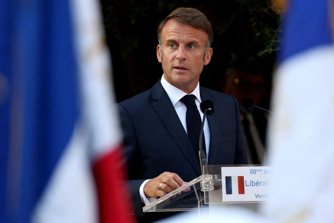 French President Emmanuel Macron speaks during a ceremony to commemorate the 80th anniversary of the liberation of the village Bormes-les-Mimosas, France, August 17, 2024.  REUTERS/Manon Cruz/Pool/File Photo