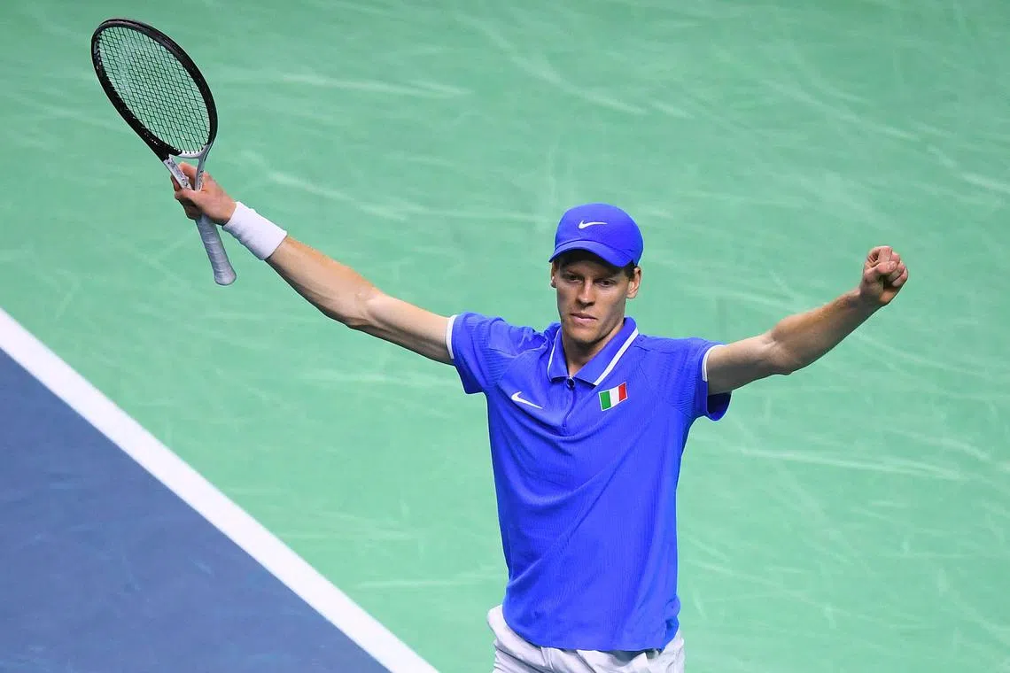 (FILES) Italy's Jannik Sinner celebrates his victory over Netherlands' Tallon Griekspoor during their final singles tennis match between Italy and Netherlands at the Davis Cup Finals at the Palacio de Deportes Jose Maria Martin Carpena arena in Malaga, southern Spain, on November 24, 2024. World number one Jannik Sinner will play the ATP tournament in Hamburg from May 18-24 after his doping ban ends in the build-up to the French Open, organisers confirmed on March 18, 2025. (Photo by JORGE GUERRERO / AFP)