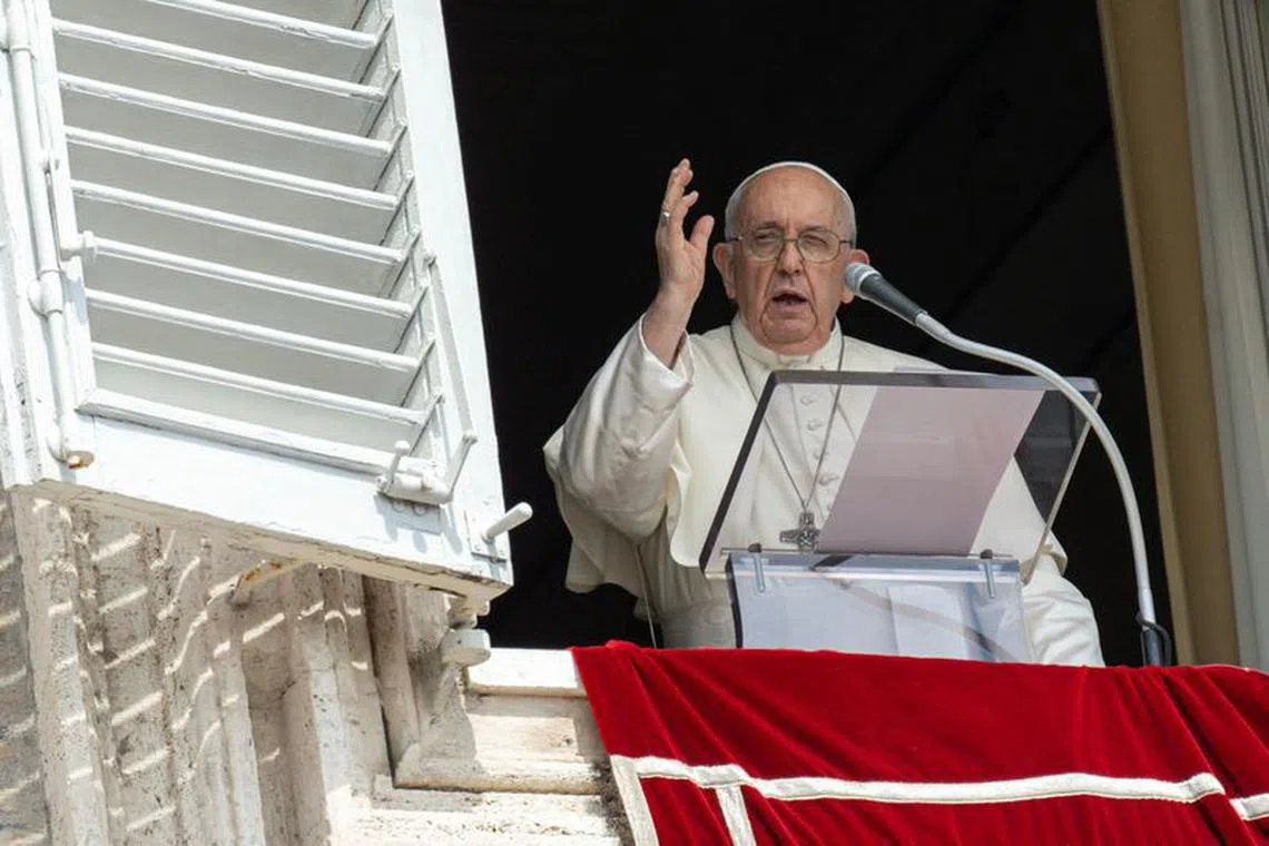 FILE PHOTO: Pope Francis leads the Angelus prayer from his window at the Vatican, August 27, 2023.  Vatican Media/­Handout via REUTERS/File photo