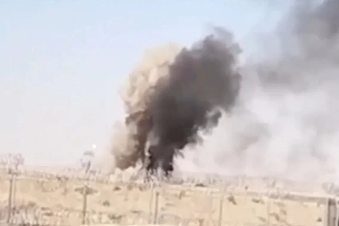Smoke rises, in this still image from handout video, said to show Pakistani forces conducting a drone strike on an Afghan Taliban border post, in Spin Boldak, Afghanistan, October 15, 2025. ISPR/Handout via REUTERS