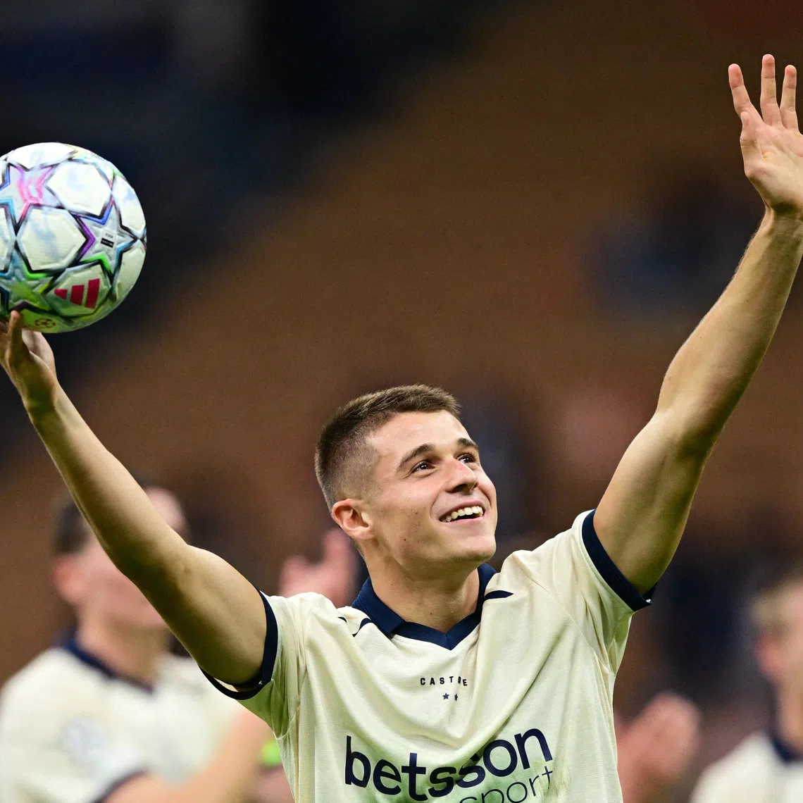 Soccer Football - UEFA Champions League - Inter Milan v Club Brugge - San Siro, Milan, Italy - October 13, 2026 Club Brugge's Nicolo Tresoldi celebrates after the match with the match ball having scored a hat-trick REUTERS/Daniele Mascolo     TPX IMAGES OF THE DAY