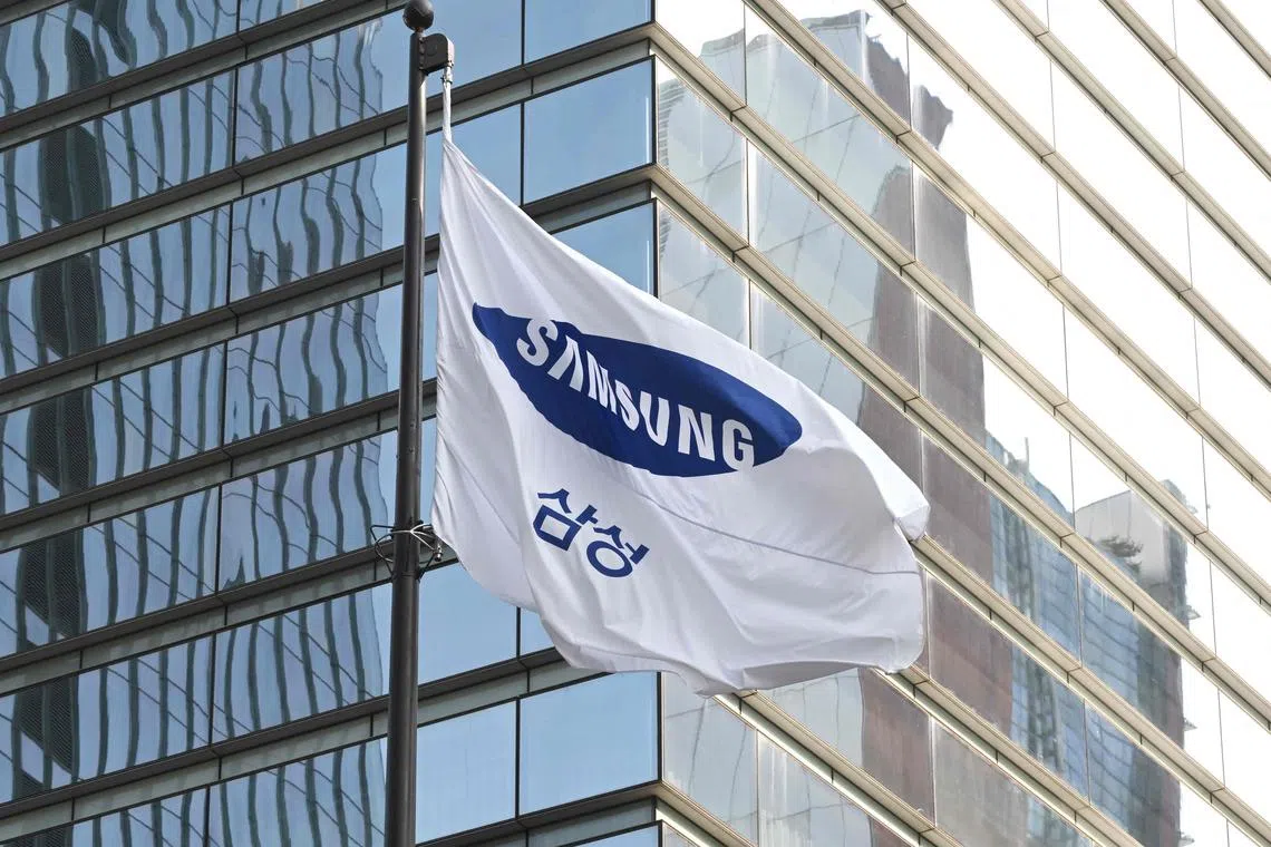 A Samsung flag flutters outside the company's Seocho building in Seoul on October 8, 2024. Samsung Electronics said on October 8 it expected third-quarter profits to jump almost three-fold, but fell short of market expectations as it struggled to leverage robust demand for chips used in artificial intelligence servers. (Photo by Jung Yeon-je / AFP)