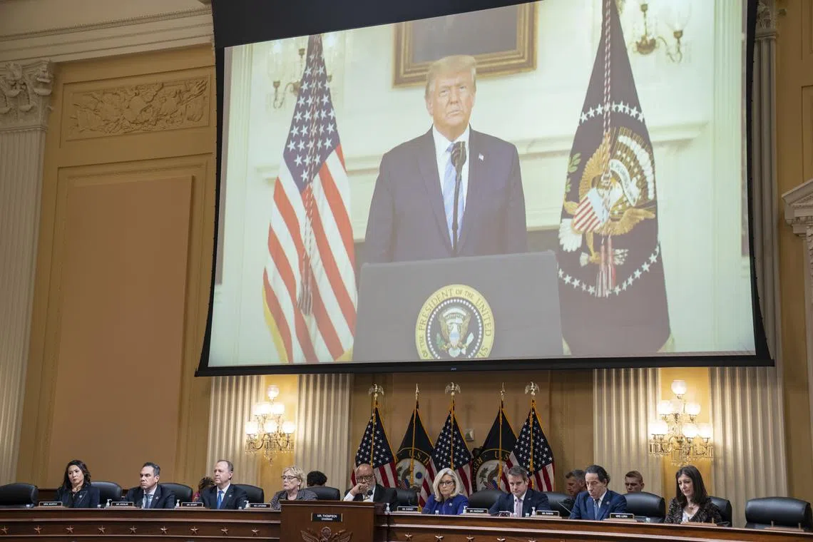 An image of former US President Donald Trump is shown as part of the Jan 6 investigation highlights, as the House committee investigating the Jan 6 attack on the Capitol meets in Capitol Hill, Washington, on Dec 19, 2022. 