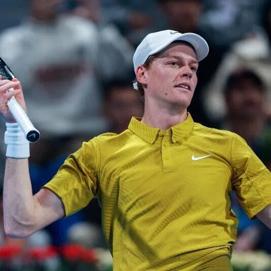 Italy's Jannik Sinner reacts during the match against Czech Republic's Tomas Machac at the Qatar Open tennis tournament in Doha.