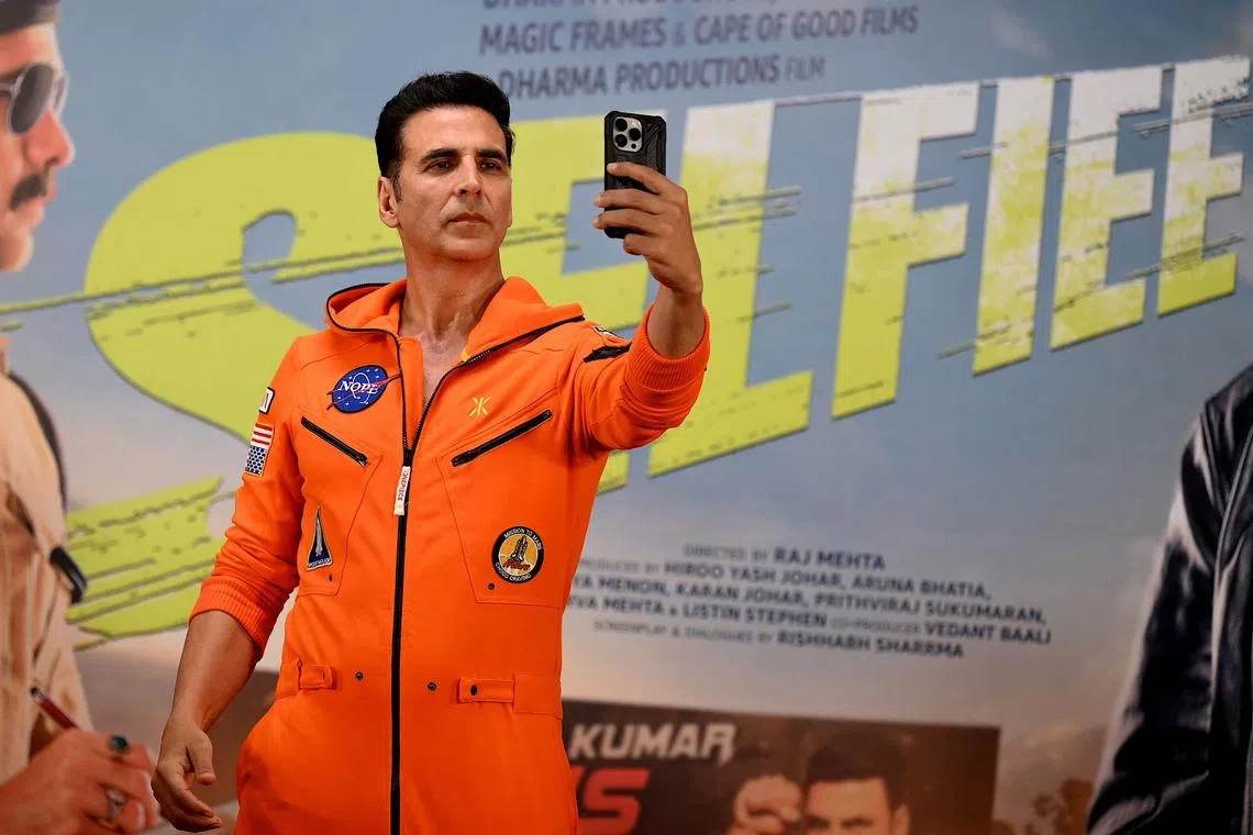 Bollywood actor Akshay Kumar taking a selfie during the promotion of his upcoming film 'Selfiee' in Mumbai on Feb 22, 2023.