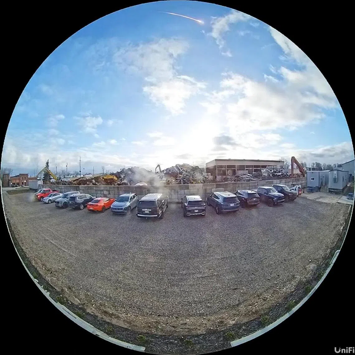 Footage from a fisheye security camera shows a meteor trail visible in the sky above a street in Elyria, Ohio, US, on March 17.