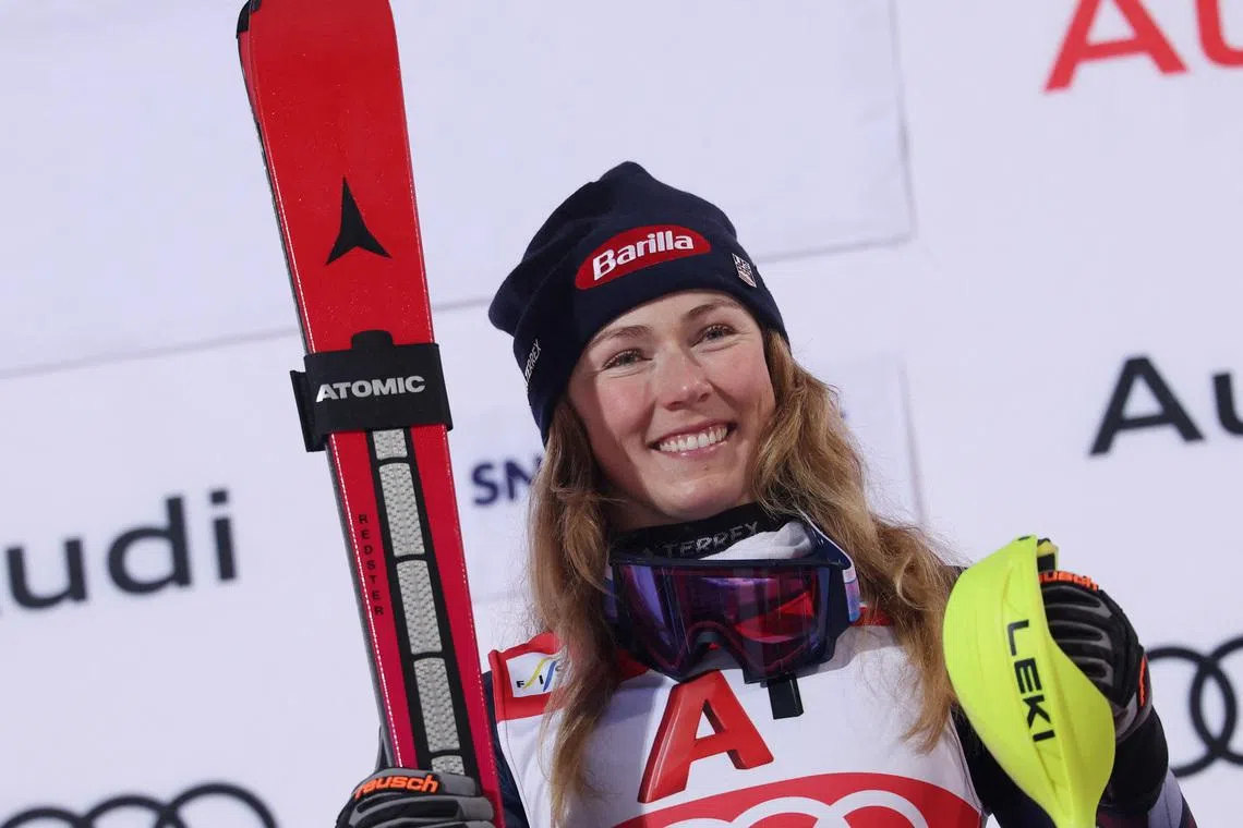 Alpine Skiing - FIS Alpine Ski World Cup - Women's Night Slalom - Flachau, Austria - January 13, 2026 Mikaela Shiffrin of the U.S celebrates on podium after winning the Women's Slalom REUTERS/Gintare Karpaviciute