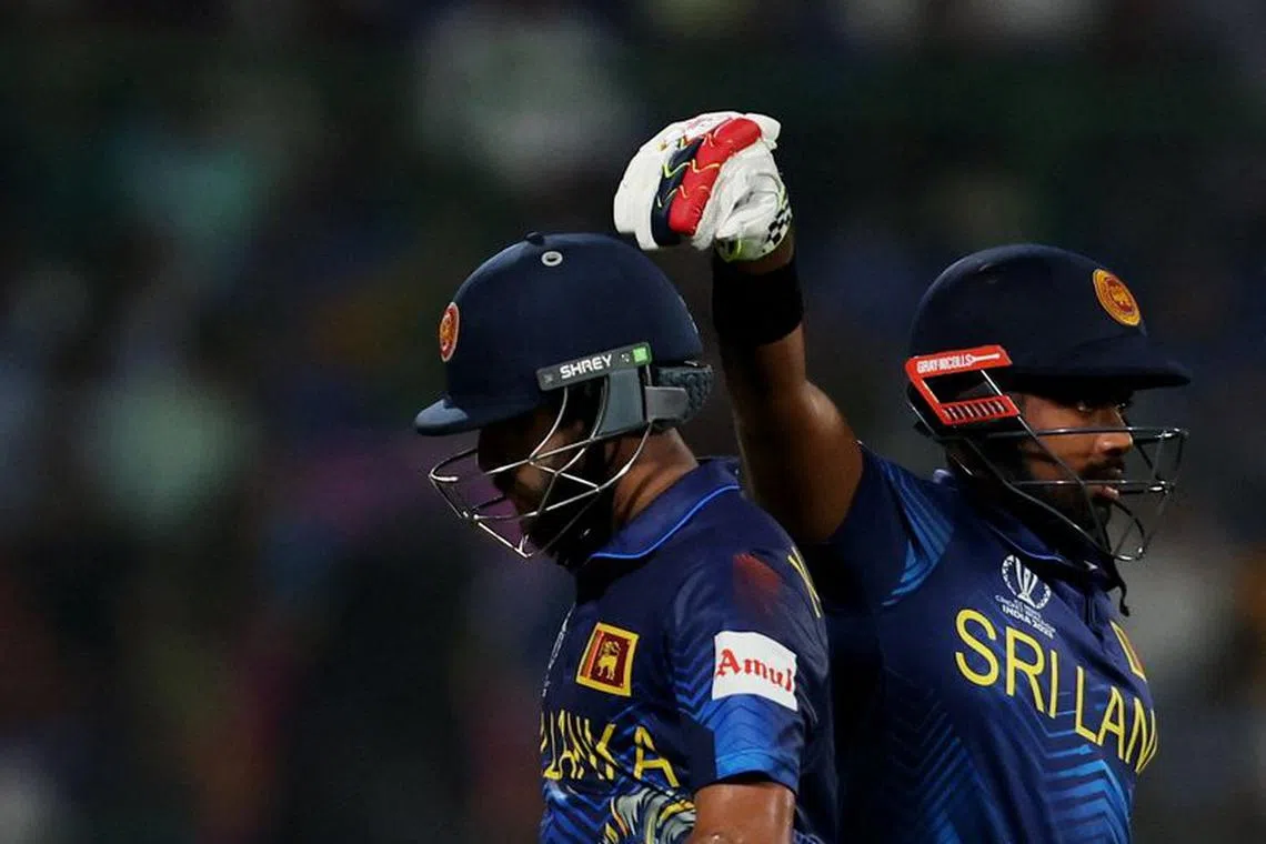 Cricket - ICC Cricket World Cup 2023 - South Africa v Sri Lanka - Arun Jaitley Stadium, New Delhi, India - October 7, 2023 Sri Lanka's Kusal Mendis is consoled by Sadeera Samarawickrama as he walks after losing his wicket, caught by South Africa's Heinrich Klaasen off the bowling of Kagiso Rabada REUTERS/Anushree Fadnavis/File Photo
