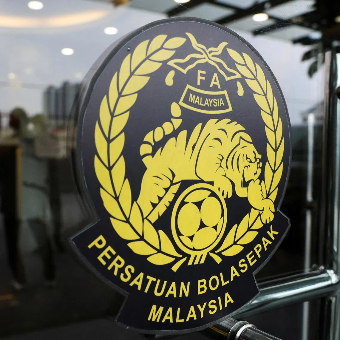 The logo of Football Association of Malaysia (FAM) is displayed at its headquarters at Petaling Jaya, Malaysia January 28, 2026. REUTERS/Hasnoor Hussain
