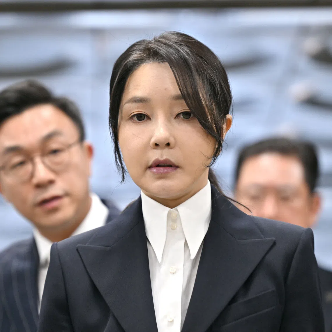 South Korea's former first lady Kim Keon Hee, wife of impeached former president Yoon Suk Yeol, arrives at a court to attend a hearing to review her arrest warrant requested by special prosecutors at the Seoul Central District Court, in Seoul, South Korea August 12, 2025.     JUNG YEON-JE/Pool via REUTERS