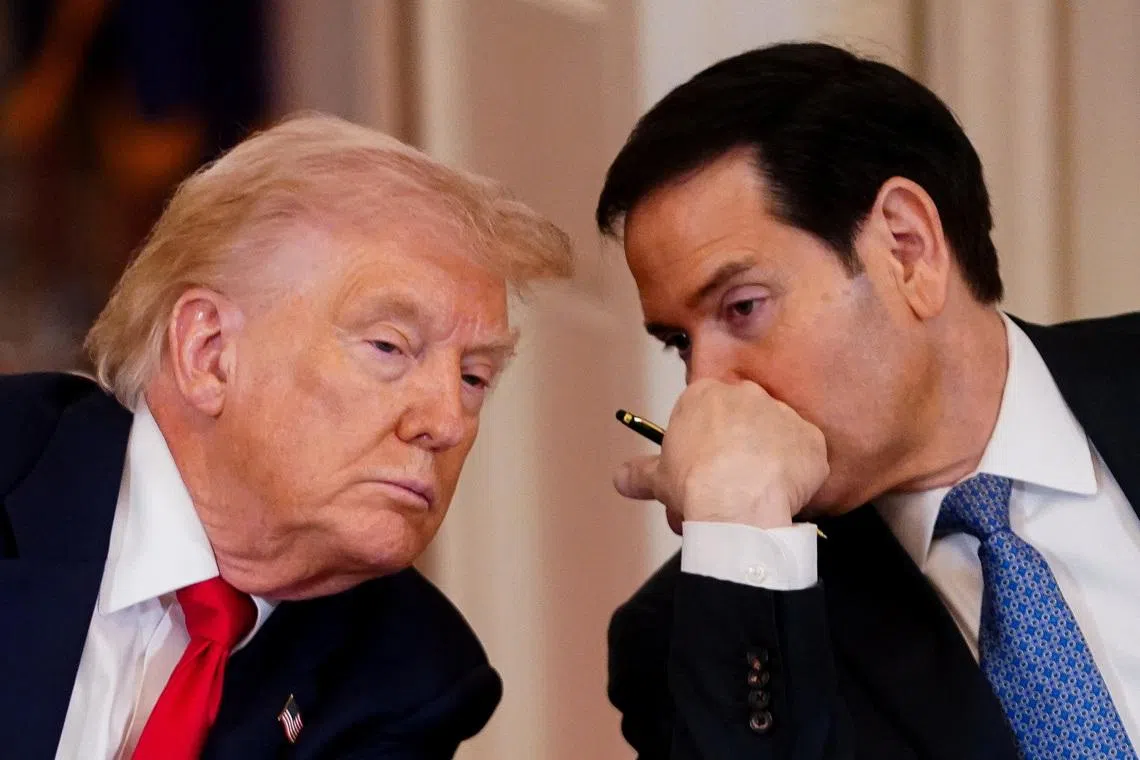 U.S. President Donald Trump listens to U.S. Secretary of State Marco Rubio during a round table in the White House in Washington, D.C., March 6, 2026. REUTERS/Nathan Howard