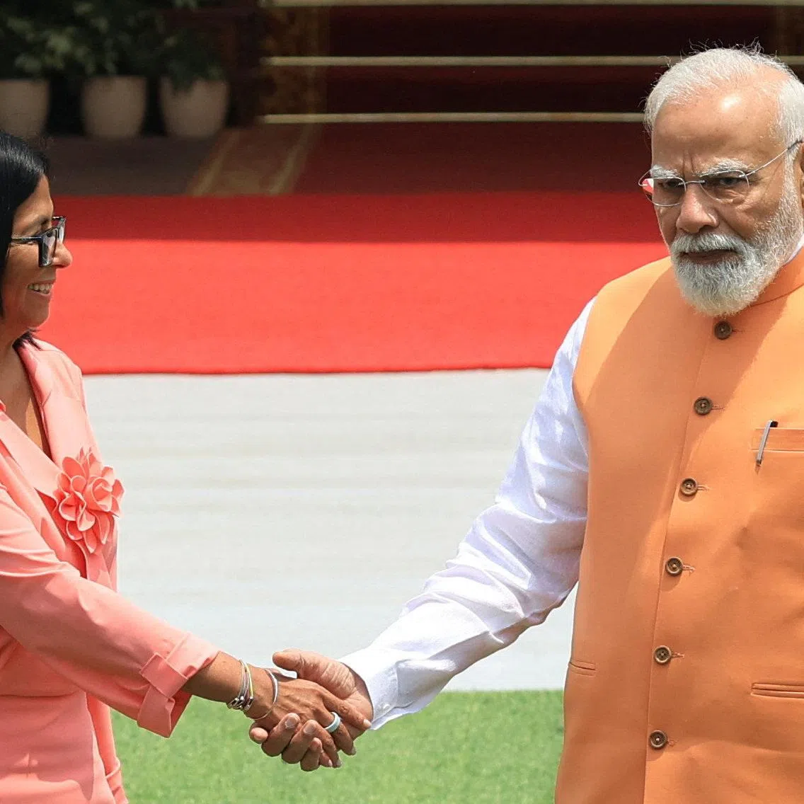 Venezuela's interim President Delcy Rodriguez shakes hands with India's Prime Minister Narendra Modi before their meeting at the Hyderabad House in New Delhi, India, June 4, 2026. REUTERS/Adnan Abidi