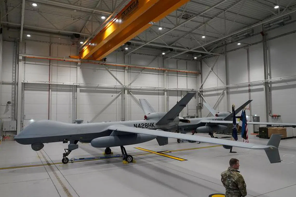 FILE PHOTO: A U.S. Air Force MQ-9 Reaper drone sits in a hanger at Amari Air Base, Estonia, July 1, 2020.  U.S. unmanned aircraft are deployed in Estonia to support NATO's intelligence gathering missions in the Baltics. REUTERS/Janis Laizans/File Photo