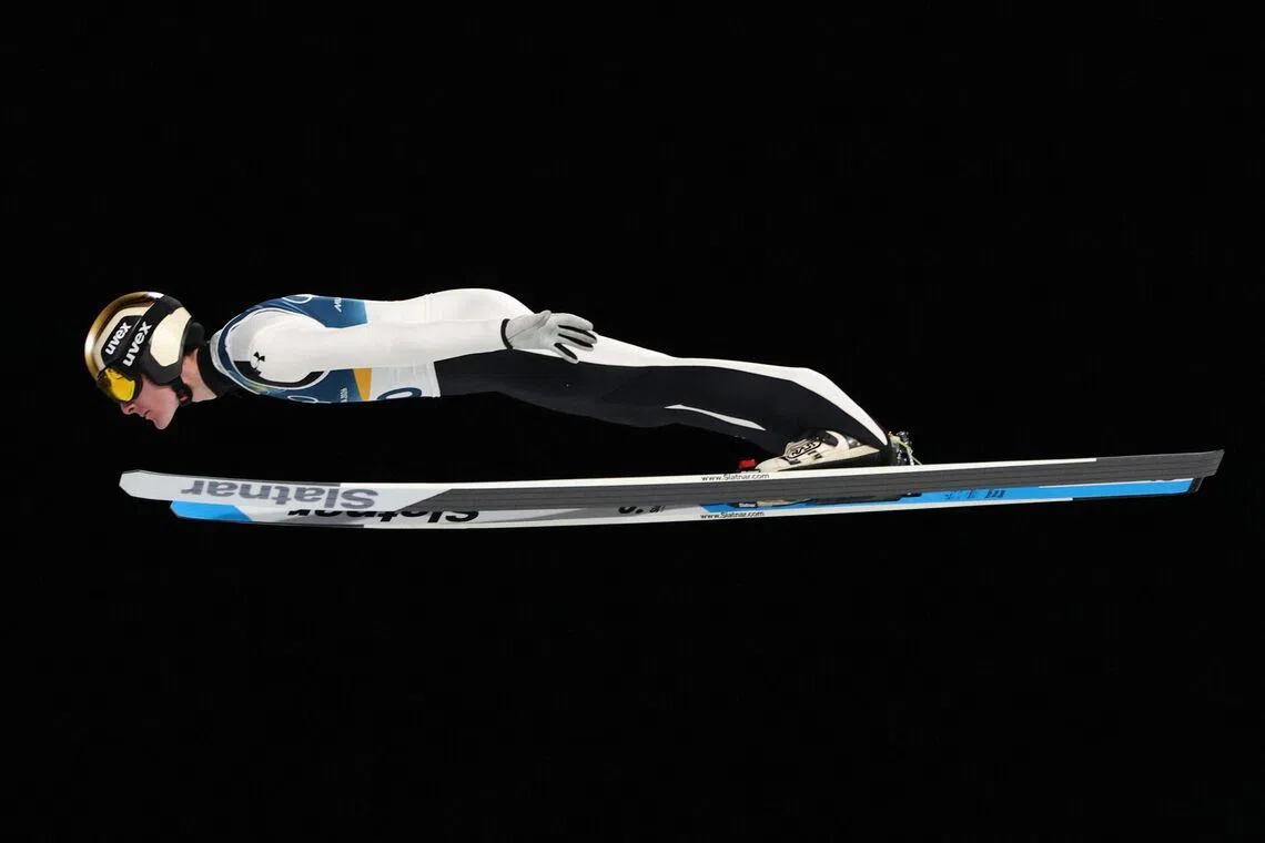 TSlovenia's Domen Prevc in action during the men's ski jumping normal hill individual trial round of the Milano Cortina 2026 Winter Olympic Games at Predazzo Ski Jumping Stadium in Predazzo (Val di Fiemme), Italy on Feb 9, 2026. 