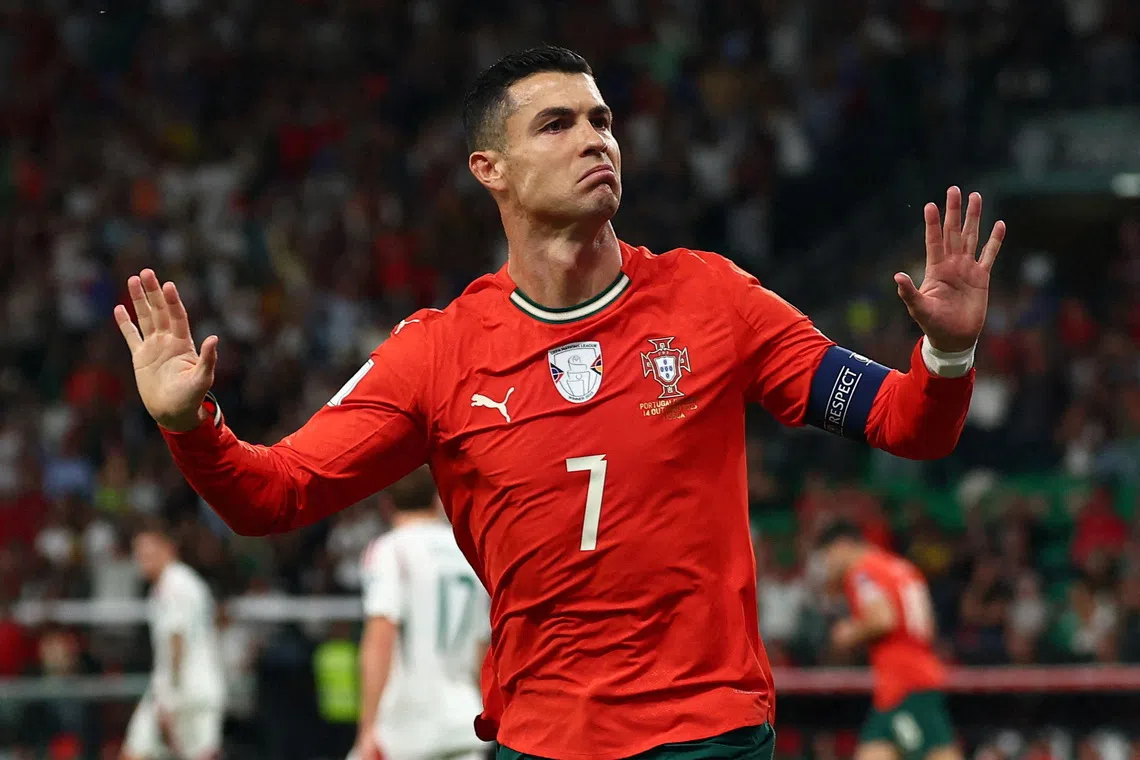 Soccer Football - FIFA World Cup - UEFA Qualifiers - Group F - Portugal v Hungary - Estadio Jose Alvalade, Lisbon, Portugal - October 14, 2025 Portugal's Cristiano Ronaldo celebrates scoring their first goal REUTERS/Pedro Nunes
