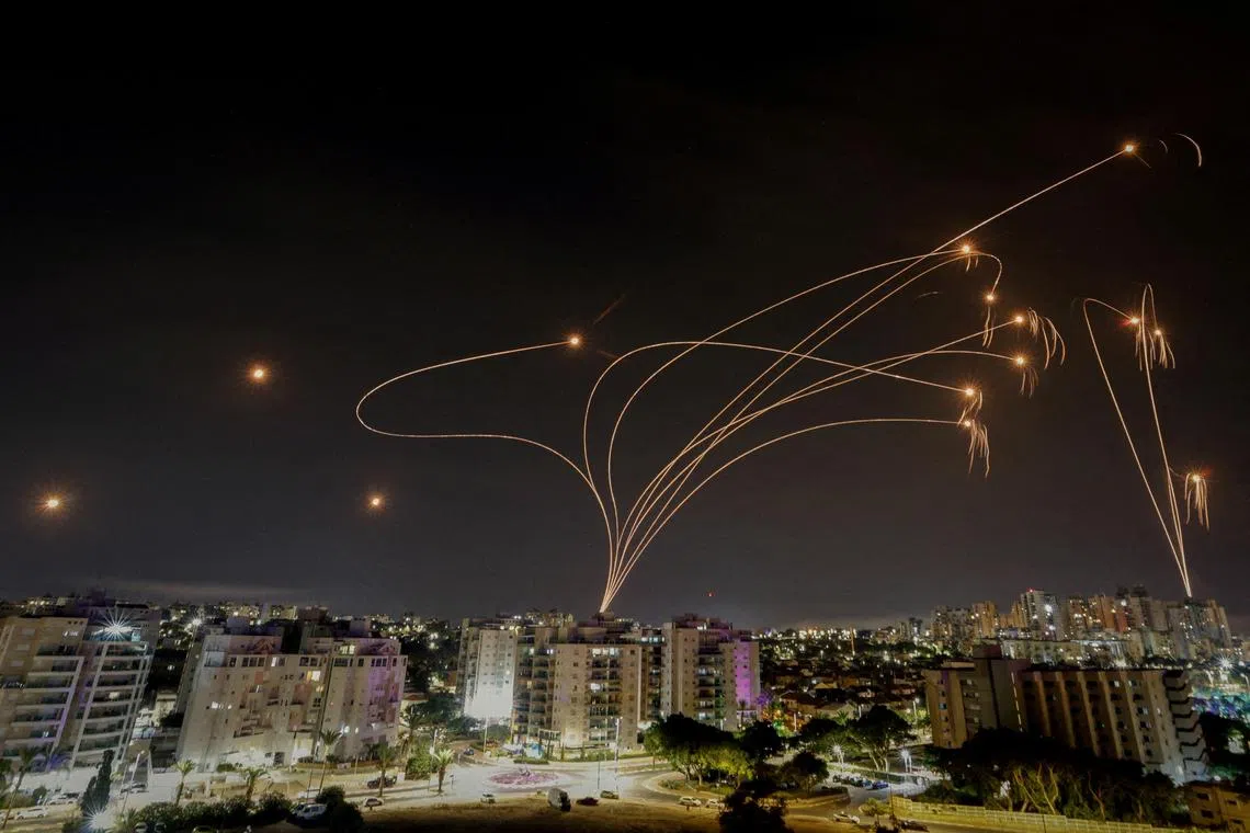 Israel's Iron Dome anti-missile system intercepts rockets launched from the Gaza Strip, as seen from the city of Ashkelon, Israel, Oct 9, 2023. 