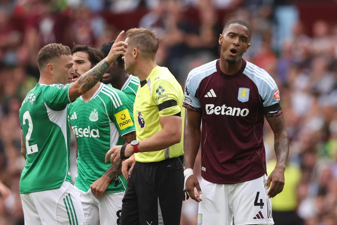 Aston Villa's Ezri Konsa (right) was sent off for a professional foul on Anthony Gordon midway through the second half.