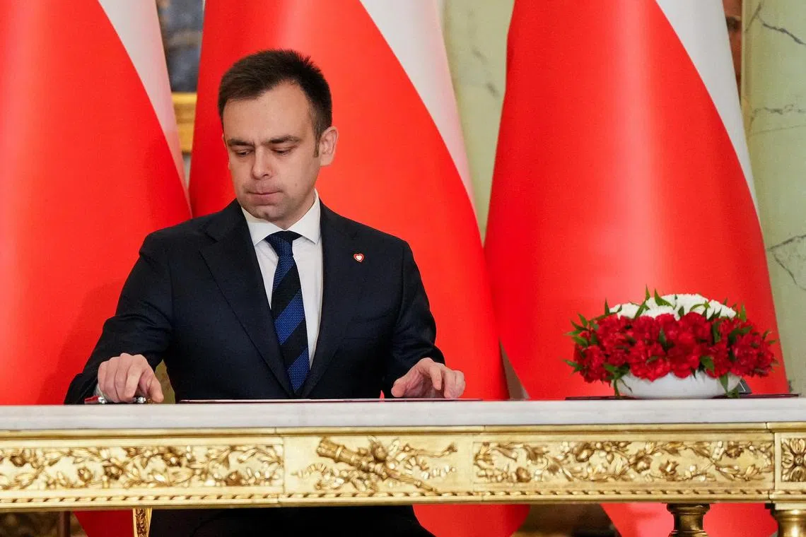 Polish Finance Minister Andrzej Domanski appealed on social media platform X for Poles to "relax", saying the zloty rate was due to "a data source error".