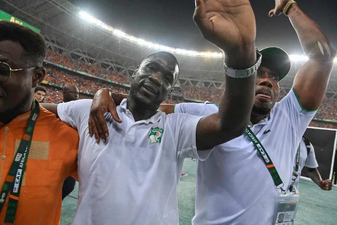 Ivory Coast's French coach Emerse Fae celebrates after his team won the Africa Cup of Nations.